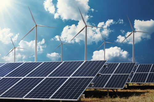 Clean Energy Power Concept Solar Panel With Wind Turbine Blue Sky Background 500x333